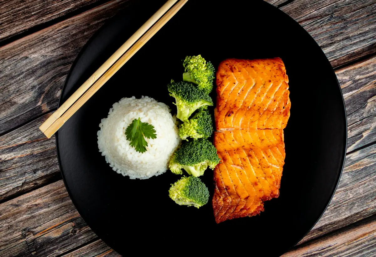 Glazed salmon with rice and broccoli